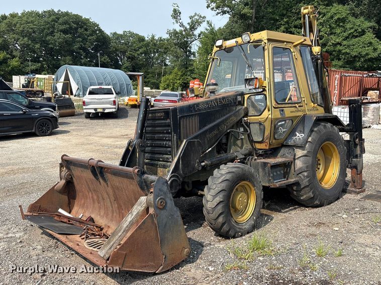 1989 Caterpillar 428 backhoe - ET8662