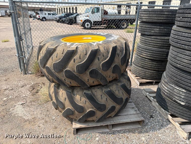 (2) 21L-24 tires and wheels - EX4091