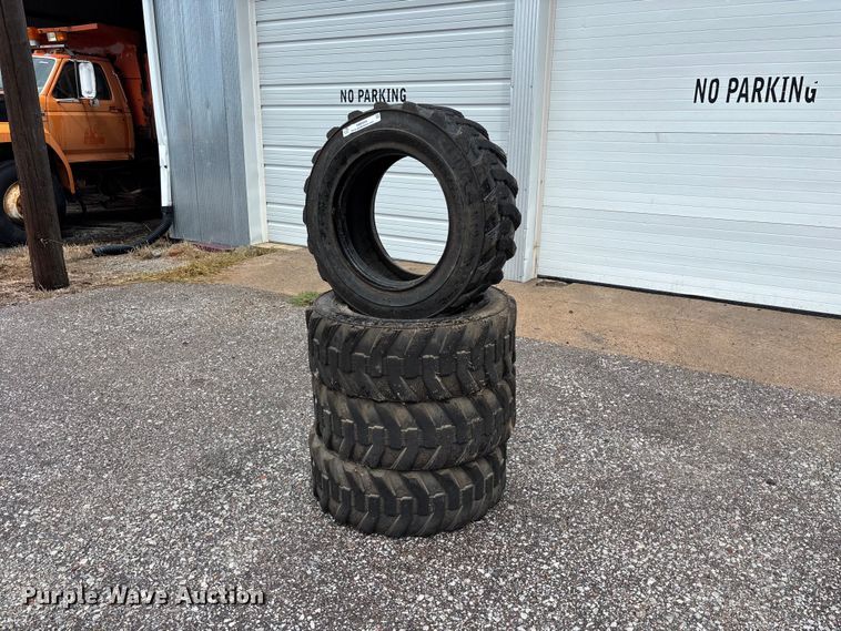 (4) 10-16.5 skid steer tires - NM9894