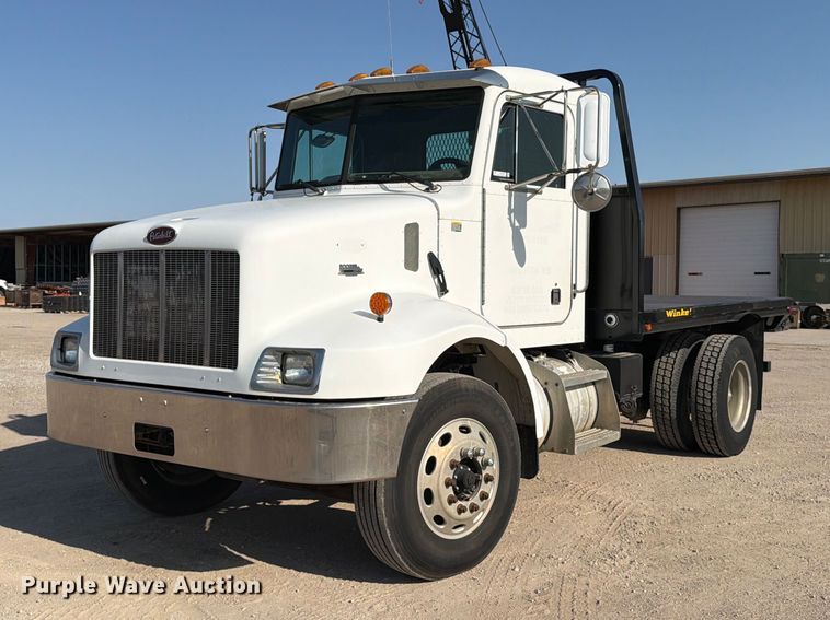 2002 Peterbilt 330 flatbed truck - MZ9896