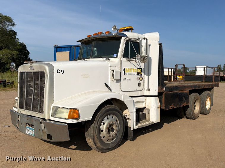 1996 Peterbilt 377 flatbed truck - FK3379