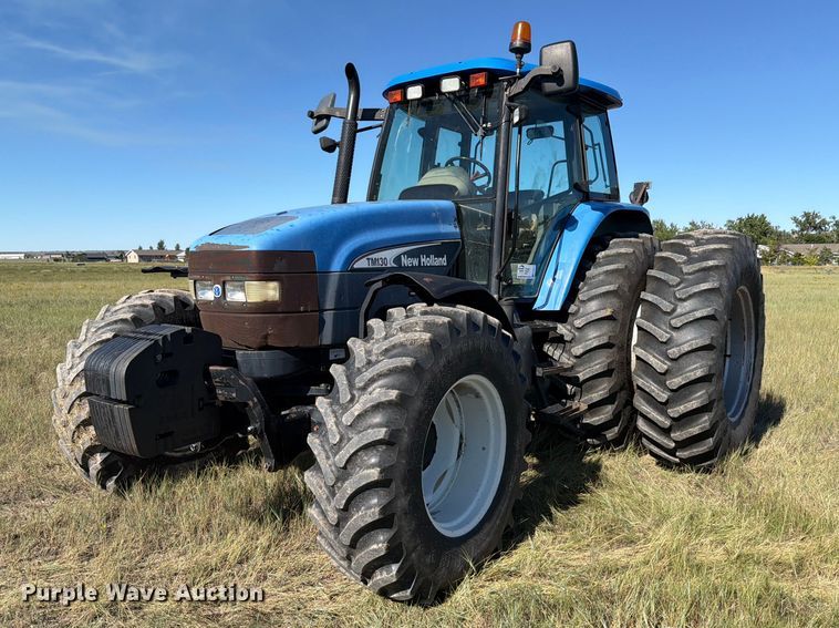 2002 New Holland TM130 MFWD tractor - EA0477