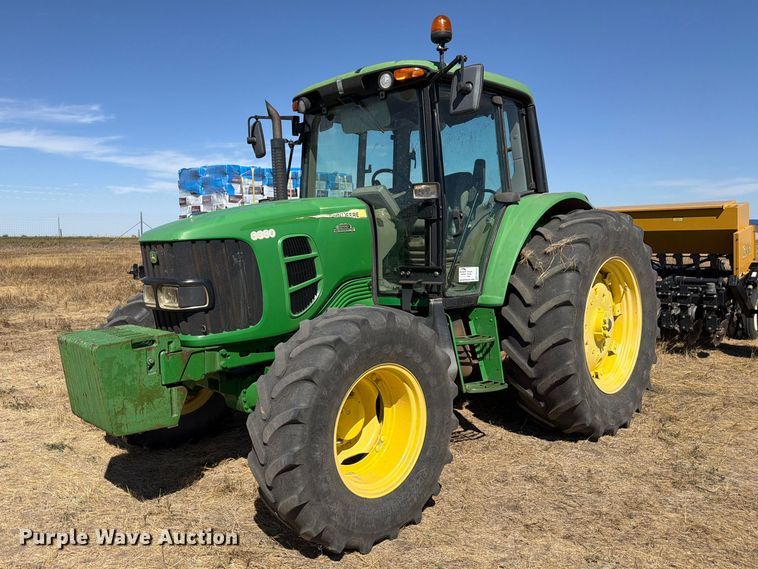 2011 John Deere 6330 MFWD tractor - FM7654