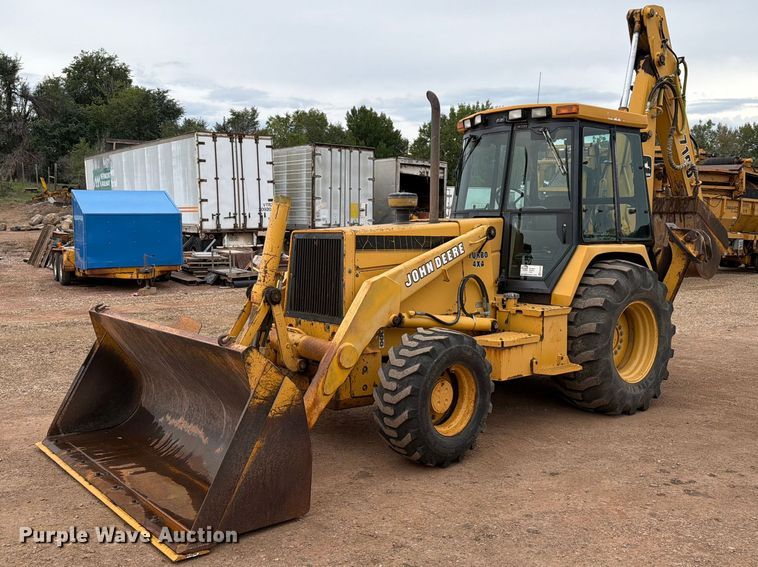 1993 John Deere 710D backhoe - EA0549