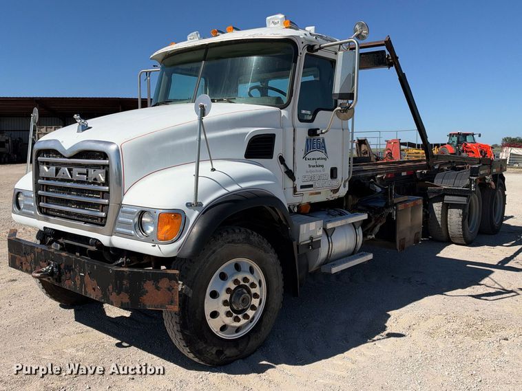 2003 Mack CV713 roll-off container truck - EX2352