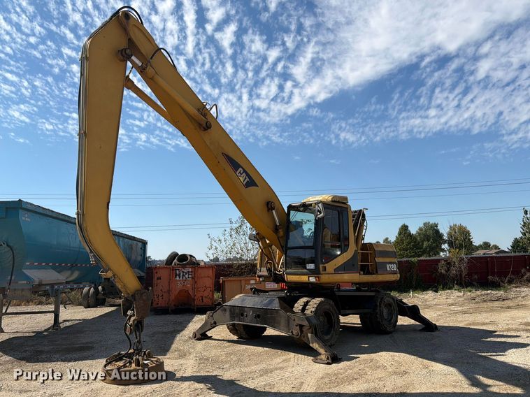 1999 Caterpillar M320 wheeled excavator - FK3834