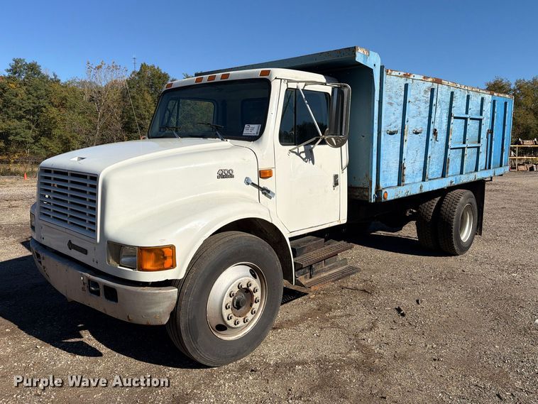 1999 International 4700 dump flatbed truck - FG3059